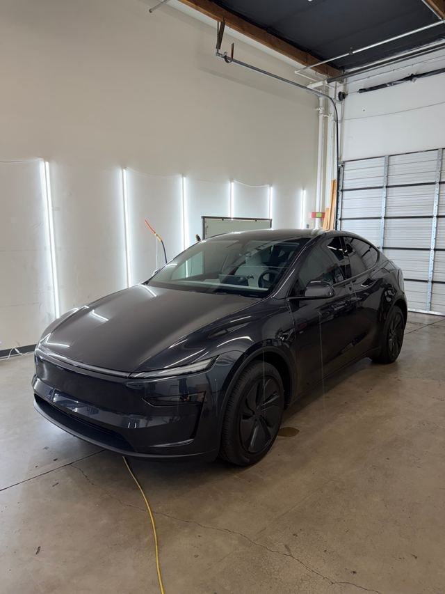 Dark gray Tesla Model Y with Phantom Tint