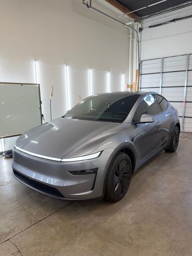 Silver Tesla Model Y with Phantom Tint