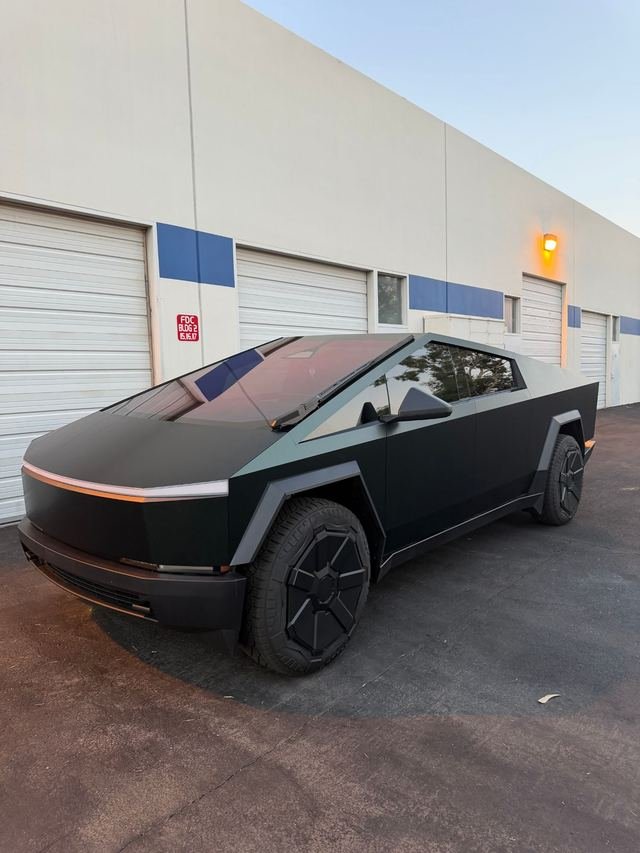 Matte dark green Tesla Cybertruck with Phantom Tint