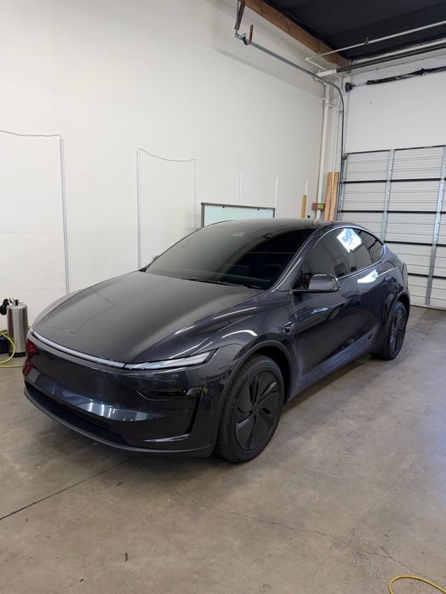 Dark gray Tesla Model Y with Phantom Tint