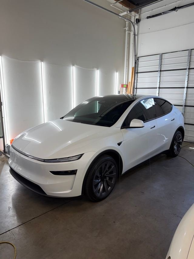 White Tesla Model Y with Phantom Tint